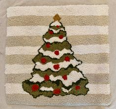 a christmas tree hooked up to a towel