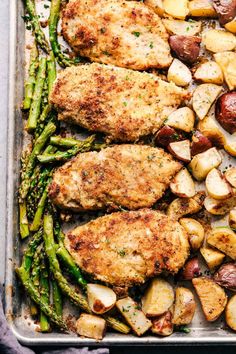 chicken, potatoes and asparagus on a baking sheet with the words above it