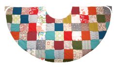 a colorful patchwork bib is shown on a white background