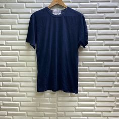 "PLEASE READ DESCRIPTION BELOW BEFORE BUYING👇🏻 *ITEM:Vintage Comme Des Garcons tshirt *ITEM DETAILS: 👇🏻 Please be aware that all vintage items will usually show a few signs of wear or fading due to age, but anything visible such as stains or holes, and serious flaws have been photographed.For any further information on this item please contact us and we will be happy to help *SIZE: LARGE *ACTUAL SIZE MEASUREMENT: 👇🏻 *PIT TO PIT(WIDTH):20\"INCHES *LENGTH(FROM SHOULDER): 28\"INCHES *ALL MEAS Unisex Vintage Black T-shirt, Vintage Comme Des Garcons, Unisex Black Cotton T-shirt, Comme Des Garcons Tshirts, Blue Cotton Spliced T-shirt, Leather Mouse, Minimalist Outfits, Personalized Mouse Pad, Comme Des Garcons Shirt