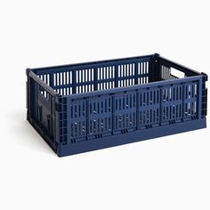 a blue plastic crate on a white background