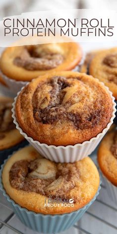 cinnamon roll protein muffins stacked on top of each other