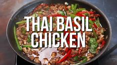 the words thai chicken in a frying pan