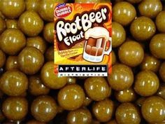 a bag of root beer floaters sitting on top of a pile of brown balls