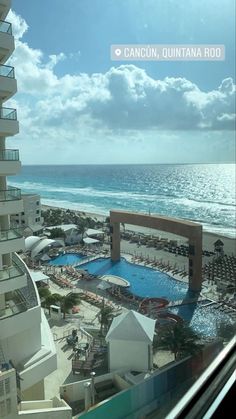 an aerial view of the beach and ocean from a high rise building in cancun, quintana rob