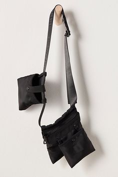 Just as effortless as it is essential, this wear-anywhere hip pack is featured in a convertible, adjustable, crossbody design with multiple pocket detailing for a super convenient style. | Side Lines Hip Pack by FP Movement at Free People, Black Black Utility Shoulder Bag With Functional Pockets, Black Utility Shoulder Bag With Pockets, Functional Crossbody Bag With Side Pockets, Black Utility Shoulder Bag With Zipper Pocket, Utility Black Shoulder Bag With Zipper Pocket, Black Travel Belt Bag With Multiple Pockets, Black Belt Bag With Multiple Pockets For Travel, Outdoor Crossbody Belt Bag With Functional Pockets, Functional Outdoor Belt Bag With Multiple Pockets