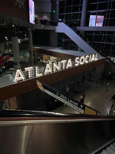 an escalator with the words atlanta social on it