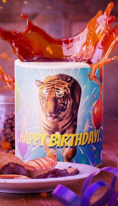 A warm and inviting rustic backdrop with chocolate cakes and a blue happy birthday coffee mug featuring an orange big cat tiger strolling through a vivid blue explosion of confetti and balloons while wishing you a happy birthday. Animal Themed Birthday Party, Tiger Birthday, Hilarious Jokes, Gifts For Veterinarians, Birthday Coffee, Animal Birthday Party, Congratulations Baby, Pet Tiger