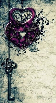 an ornate key with a heart shaped lock hanging from it's side on a chain