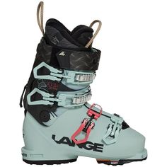 the large pair of ski boots has two straps attached to it's soles