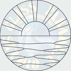 a circular stained glass window with the sun rising over water