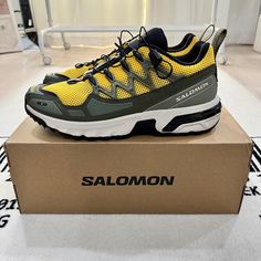 Brand New In Box. Salomon Acs + Og Buttercup Olive Night Black Sneakers L47134600 Breathable Mesh On The Upper Means Everyday Comfort In This Sporty Shoe Featuring A Protective Powerband And Enhanced Padding On The Medial Side. 1 1/2" Heel (Size 11.5) Quicklace Closure Offers One-Pull Tightening Agile Chassis System (Acs) Maintains Heel-To-Toe Stability On Distance Runs Energycell+ High-Rebound Midsole Fuses Durable Cushioning With Exceptional Energy Return Mud Contagrip Tread Provides Grippy Fo Functional Yellow Lace-up Running Shoes, Yellow Lace-up Athleisure Running Shoes, Yellow Running Shoes With Cushioned Footbed For Outdoor, Yellow Running Shoes With Cushioned Footbed For Outdoor Activities, Yellow Outdoor Running Shoes With Cushioned Footbed, Yellow Low-top Sneakers For Outdoor Activities, Casual Yellow Running Shoes For Sports, Functional Yellow Sports Sneakers, Sporty Yellow Running Shoes For Outdoor