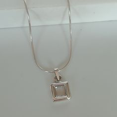 ▪︎ ONE sterling silver square shaped pendant/charm. ▪︎ Size: 10 x 10 mm Jump ring: 3 mm Weight: 1.2 gm ▪︎ This pendant is handmade with hypoallergenic sterling silver. Most of my pieces are marked with a 925 silver stamp. ▪︎ This multi purpose pendant can be used as a charm in necklaces, bracelets, key chains, zip pullers etc. Most of my pieces are marked with a 925 silver stamp. ▪︎ Please note: This listing is for ONE pendant and comes WITHOUT the chain, however, you can add a snake chain in th Dainty Sterling Silver Charm Necklace With Square Pendant, Modern Necklace With Box Chain And Square Pendant, Minimalist Metal Necklace With Rectangular Pendant, Modern Jewelry With Clavicle Chain And Square Pendant, Sterling Silver Charm Necklace With Rectangular Pendant, Square Pendant Necklaces With Charms, Everyday Metal Necklace With Square Pendant, Modern Metal Necklace With Square Pendant, Everyday Square Pendant Charm Necklace