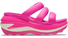 The look and feel of our Classic Mega Crush Clog is now available in this unique slide sandal design. Introducing the Mega Crush Triple Strap, featuring an enhanced rubber tread, updated detailing around the outsole and a platform ready to take any outfit to the next level. A puffy, three-strap upper provides a stylish look, while keeping your foot secure. Are you ready for your new crush?  Mega Crush Triple Strap Details:    Unique wavy sole design with enhanced rubber tread   Upper features th Synthetic Platform Slides, Synthetic Platform Slide Sandals, Platform Slides Made Of Synthetic Material, Summer Clogs With Translucent Outsole, Casual Pink Eva Slides, Pink Synthetic Platform Sport Sandals, Trendy Slides With Arch Support, Modern Pink Slides For Spring, Synthetic Platform Slide Sport Sandals