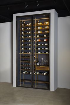 the wine cellar is full of bottles and glasses