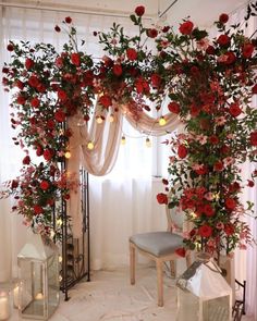 a room decorated with flowers and candles