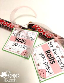 two valentine's day candy bar wrappers with pink ribbon