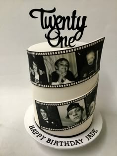 a three tiered birthday cake decorated with photos and the words twenty one on top