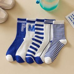 Stay warm and stylish this winter with this 10-piece set of Women's White and Blue Stripes Winter High Tube Socks. Expertly crafted from luxurious polyester, this exquisite collection of hosiery features a classic middle-tube height and a timeless striped pattern. Whether you're cuddled up at home or strutting around town, these socks are sure to keep you cozy and chic. Features: Pair: 5 Pairs Socks Tube Height: Middle Tube Pattern Type: White And Blue Stripes Sock Type: Casual Thickness: Thick Happy Personality, Cheap Socks, Socks Funny, Men Socks, Women Crew Socks, Funny Socks, Striped Socks, Tube Socks, Casual Stripes