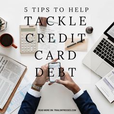 a person sitting at a desk with their cell phone in front of them and the words 5 tips to help tackle credit card debt