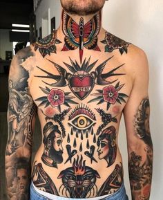 a man with lots of tattoos on his chest