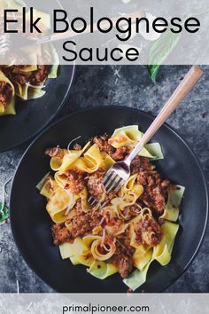 two black plates filled with pasta and meat sauce