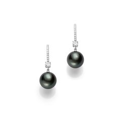 These Mikimoto Classic Black South Sea pearl earrings are made of 18K white gold. The earrings feature 11mm A+ quality black South Sea pearls accented by diamonds. Classic Tahitian Pearl Earrings In White Gold, Classic White Gold Tahitian Pearl Earrings, Luxury Tahitian Pearl Earrings In White Gold, Black Sterling Silver Pearl Earrings For Formal Occasions, Elegant Black Round Pearl Earrings, Luxury Black Pearl Earrings Gift, Luxury Black Pearl Earrings For Gift, Elegant Black Tahitian Pearl Earrings, Formal Black Tahitian Pearl Earrings