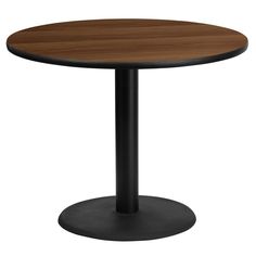 a round wooden table with black base and an oak top, viewed from the front