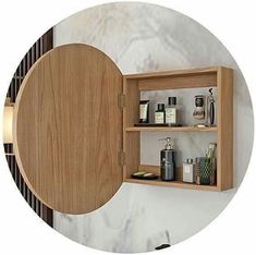 an open wooden cabinet on the wall with various items in it, including soaps and lotion