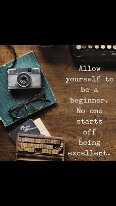 an old typewriter, keyboard and glasses on a wooden table with the words allow yourself to be a beginner no one starts off being excellent