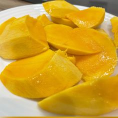 slices of yellow squash on a white plate