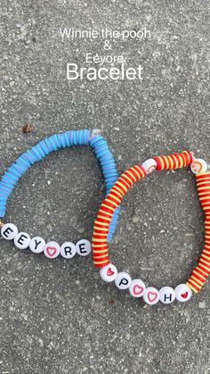 two bracelets made out of plastic beads with words written on them and the word love spelled