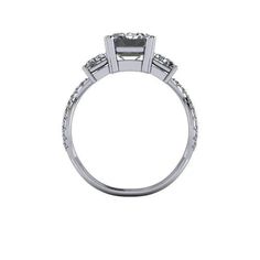 A three stone moissanite engagement ring set with a 9x7mm, 2.60 ct emerald cut Colorless Moissanite and two 6x4mm, .58 ct emerald cut Colorless Moissanite. Woven Shank, 36 round colorless moissanite, .26 ct. 3.76 carat total weight. *The ring is custom made just for you in your ring size and metal preference. *Please contact us prior to purchasing with any questions, we are happy to help. Modern Emerald Cut Moissanite Jewelry, Modern Moissanite Emerald-cut Ring, Promise Emerald Cut Moissanite Rings, Modern Moissanite Emerald Cut Ring, Promise Emerald Cut Lab Grown Diamond Jewelry, Emerald Cut Lab Grown Diamond Promise Jewelry, Diamond White Three-stone Emerald Cut Jewelry, Moissanite Emerald Cut Promise Jewelry, Promise Jewelry With Emerald Cut Moissanite