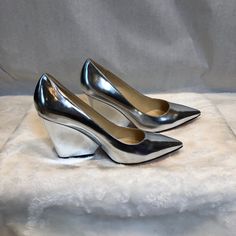 Nwt Never Been Worn Kate Spade Block Heel Shoes In Metallic Silver, Size 7. See Tags On Bottom - Originally $328; I Paid $158.97. These Would Be Amazing With Holiday Outfits!!! Kate Gray Shoes, Be Amazing, Block Heel Shoes, Kate Spade Shoes, Heel Shoes, Holiday Outfits, Shoes Women Heels, Block Heels, Metallic Silver