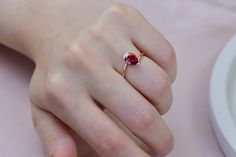 14k Rose Gold Garnet Engagement Ring, Teardrop Cut Garnet Ring, January Birthstone Ring,  Anniversary Ring, Gift For Her, Mothers Day Gift Item Gemstone: AAA Grade Garnet Cubic Zirconia Size: 8*6 Color: Red Shape: Pear Average Quality: AAA+ 🎉All of gold options of the product are produced from solid gold. 🎉While using the product, it's healthier to avoid touching the cream and similar products in terms of cleaning the product. 🎉Items are shown larger in pictures to show details-please note the dimensions. Package 🎀 All of these products are sent carefully packed in elegant jewelry boxes. 🎁 How to order 🤳🏼 🎉First step: Click on the product. 🎉Second Step: Select the material. 🎉Third Step: Select the ring size. Production Times⌛ *These items are my shop are handmade made to order. Classic Pear-shaped Red Rings, Classic Red Pear-shaped Rings, Red Ruby Pear-shaped Rings, Pear-shaped Ruby Rings In Red, Pear-shaped Red Ruby Rings, Red Pear-shaped Ruby Ring, Red Teardrop Ruby Ring For Gift, Pear-shaped Red Ruby Ring Gift, Fine Jewelry Red Pear-shaped Ring