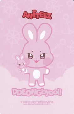 a pink card with an image of a bunny holding a small toy in it's hand