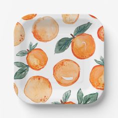 a plate with oranges painted on it