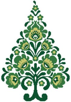 a green and white christmas tree with flowers on it's side, in the shape of a flower