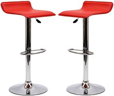 pair of red bar stools with chrome base and footrests on white background