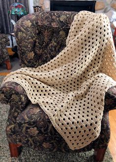 a chair with a blanket on top of it