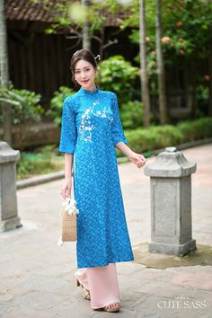 Our Gấm Collection Áo Dài is a fusion of delicacy and comfort. Made with luxurious Gam silk and is available in a size-inclusive range, this collection Áo Dài offer versatility, effortlessly transitioning from season to season.  ❣️ This set includes one Ao Dai Top and  Pants Style: Traditional  Material: Gam Silk. Little Stretch ❣️ This beautiful and modern ao dai set is perfect for any special occasions: Lunar NewYear, Mid Autumn Festival, Attending Wedding, or a Family photoshoot. ❣️ Please note: - Sizing may run smaller than American standard sizes, please refer to the sizing charts for sizing. - Please contact me if you have any questions ❣️We are proud to provide you with the highest quality fabric, handpicked modest colors, wide-range of designer styles and sizes. At Ao Dai byCuteSas Modern Ao Dai, Vietnamese Ao Dai, Prussian Blue, Autumn Festival, Mid Autumn, Mid Autumn Festival, Pants Style, American Standard, Family Photoshoot