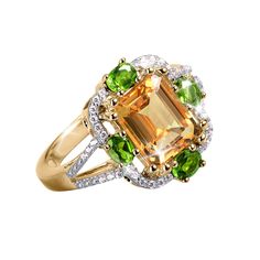 This gorgeous ring uses only the finest large carat weight Citrine, the sunny golden yellow colored gem. This magnificent stone weighs just under 2.5 carats and is set into the finest sterling silver plated in the warmth of 18k yellow gold. Bordered around the edge are 4 vivid jungle green chrome diopside stones. With our signature Diamondeau®, the supreme diamond alternative intricately set in-between and flowing down the split shoulder design, adding the final touches of shimmering delight. Beautiful Tiaras, Golden Yellow Color, Green Chrome, Citrine Jewelry, Jungle Green, Diamond Alternatives, Ladies Ring, Sparkle Jewelry, Gold Earrings Designs