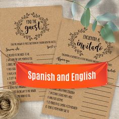 spanish and english wedding stationery with twine on the table next to each other