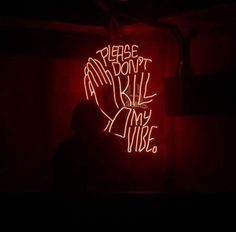 a neon sign that says please don't kill my vibe in white writing on it