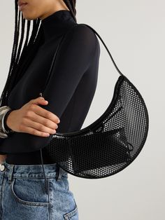 Alaïa's 'Demi' bag is named after its half-moon shape. Made from mesh, it's trimmed with contrasting leather and has enough space inside to stow your phone, wallet, keys, lip gloss and mints - we suggest keeping the smaller items in the accompanying zip pouch so they don't slip out or get caught in the open construction. Alaia Fashion, Dramatic Ethereal, Mesh Bags, Flat Dress Shoes, Dress Flats, Moon Shape, Raffia Bag, Aesthetic Pastel, Pastel Wallpaper