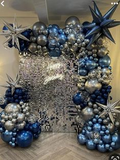 an elaborate blue and silver christmas decoration