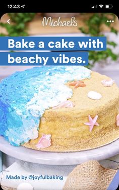 a cake with blue icing and pink starfish on it is sitting on a plate