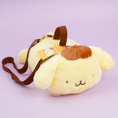 Go on adventures together with this super kawaii Pompompurin plushie bag! You can take this bag with you in two different ways. One as a shoulder bag and the other as a handbag! Made from soft, fluffy material Features two different straps Pom Pom Purin Headband, Pom Pom Purin Hello Kitty, Pompompurin Backpack, Pompompurin Merch, Kawaii Pompompurin, Plushie Bag, Aesthetics Accessories, Cute Bed Sheets, Sanrio Things