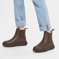 An elevated take on an icon. We've brought a closet staple bang up to date – setting a classic Chelsea boot upper on a superchunky (yet lightweight) sole. Clean. Contemporary. Crafted in smooth high-quality leather, with minimal seaming, and simple lines that complement almost any outfit. Thick stretch panels on both sides and pull tabs ensure easy on/off. Featuring a new flatform-version of our Microwobbleboard™ midsole to deliver unbeatable comfort, non-stop cushioning (and a little extra height). Cool Britannia with a modern edge. Fitting note: Please be aware that these boots have an 'average to slim' width fit, so may feel narrower than other styles on our Microwobbleboard midsole. Everyday Ankle Boots For Winter, Everyday Winter Ankle Boots, Winter Everyday Ankle Boots, Everyday Winter Boots With Rubber Sole, Winter Boots With Rubber Sole For Everyday Use, Modern High Ankle Boots With Rubber Sole, Everyday Winter Leather Boots, Ankle-high Chelsea Boots For Streetwear In Fall, Textured Sole Boots For Fall Streetwear