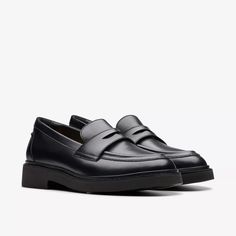 Womens Splend Edge Black Leather Loafers | Clarks US Classic Slip-on Moccasins With Lug Sole, Slip-on Platform Loafers With Contrast Sole For Workwear, Classic Leather Slip-ons With Lug Sole, Classic Leather Loafers With Lug Sole, Timeless Leather Slip-ons For Work, Timeless Round Toe Slip-ons For Work, Slip-on Platform Loafers With Rubber Sole For Work, Classic Platform Loafers With Stitched Sole For Business, Modern Slip-ons With Leather Footbed For Work